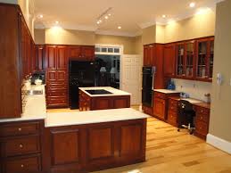 Pin By Sharon Aldahl On Kitchen Remodel Ideas Cherry Cabinets Kitchen Kitchen Cabinets And Countertops House Design Kitchen