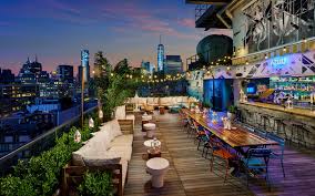 The setting at the rooftop is 'luxurious cocktail bar', with leather chairs, a stylish design, so really a sophisticated oasis above the buzzing streets below. The 13 Best Rooftop Bars In Manhattan