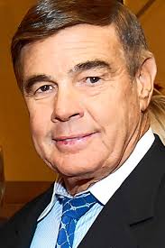 Hotelier Seeks to Fend Off Wily Rival