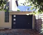 Installer une porte de garage sectionnelle -