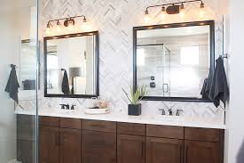 Learn how to hang the mirror and install the light fixture in this video. Custom Mirror Frames Framed Bathroom Vanity Mirrors