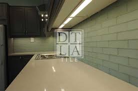 New improved kitchen backsplash tile. Ikea Quartz Countertop With Ikea Led Lights And Glass Tiles Downtown Los Angeles Tile Contractor