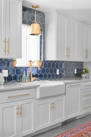 A modern small kitchen with matte grey cabinets, white marble counters and a backsplash and matching lamps. 75 Beautiful Blue Kitchen Pictures Ideas February 2021 Houzz
