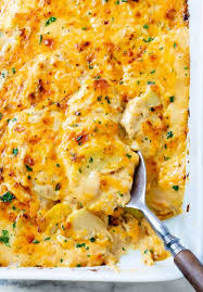 In the late 1800s, this term referred to mashed potatoes, covered in grated cheese, and baked in scallop shells. Cheesy Scalloped Potatoes The Cozy Cook