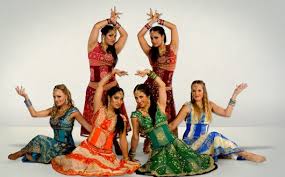 I just love the colors of her clothes, the bright pinks, reds and gold! Bollywood Dancers Artists And Dancers In Goa