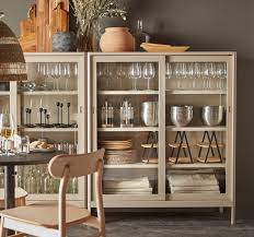 The doors on the sink cabinet have suffered water damage while the ones near the stove suffer steam damage. Idasen Cabinet With Sliding Glass Doors Beige 120x140 Cm Ikea