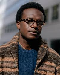 Colour, size and drama: How to dress like André Larnyoh