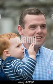 Forres, Scotland, UK. 5th Aug, 2020. Pictured: (L-R) Alistair Ross; Douglas  Ross MP; Krystle Ross. Douglas Ross MP is new leader of the Scottish  Conservative and Unionist Party, after former leader, Jackson
