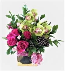 Classy Cymbidium And Roses In Naples Fl Focus Floral