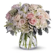 Simply beautiful and wonderfully monochromatic, this delicate floral trail belongs on a wall (or four) in your home. Beautiful Whisper By Teleflora In Suffield Ct Vine Ivy Floral Design K P Flowers