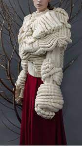 Artika home » hand knitting » contemporary pattern design details. Contemporary Sculptural Fashion Knitwear With Layers Of Fabric And Pleats Knitwear Fashion Knit Fashion Knitting Designs