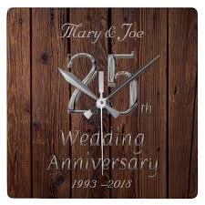 The theme for a 25th wedding anniversary is silver, so buying or making anything silver is certainly the order of the day. Silver Wedding Anniversary 25th Anniversary Rustic Square Wall Clock Zazzle Com Silver Wedding Anniversary 25th Wedding Anniversary Silver Wall Clock Elegant
