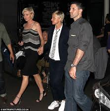 Ellen DeGeneres nuzzles into wife Portia De Rossi as the couple enjoy a  romantic date night Down Under | Daily Mail Online