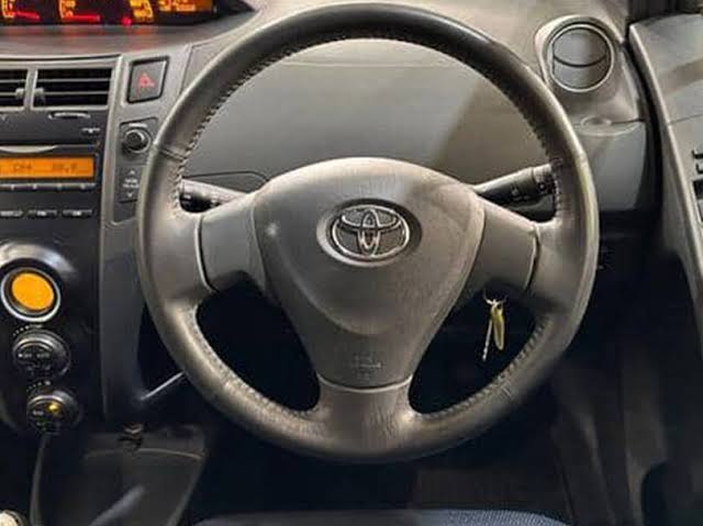 Spacious interior and digital dashboard of the 2006 Toyota Vitz Ethiopia, AI generated