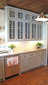 Gray Cabinets And Oak Hardwood Floors Kitchen Inspiration With Glass Upper Cabinets And White Subway Tile Ba Lake House Kitchen Kitchen Remodel Kitchen Design