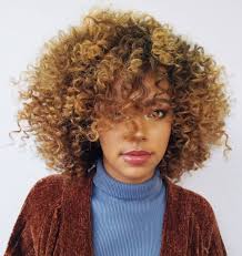 With coily hair, this cut will open up the interior in order to make room for the curl to form. The Revolutionary Deva Cut Tailored For Your Unique Curls