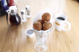 You need to go to the closest denny's asap. Pancake Puppies Rolled In Cinnamon Sugar And Served With A Side Of Syrup Picture Of Denny S Dubai Tripadvisor