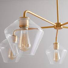 A chandelier is a key opportunity to make a big design statement. Build Your Own Sculptural Glass 5 Light Chandelier