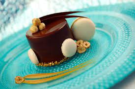 Dessert Just Got Glamorous Our Chocolate Praline Timbale Desserts Delicious Desserts Chocolate Desserts