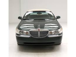 Image result for Charcoal Green 1999 Town Car