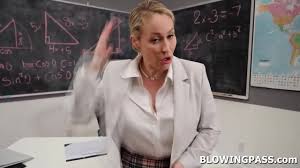 Teacher Ryan Keely gets bored waiting for the meeting.She teased her  student,shows him her big tits before sucking and deepthroating his big  cock. - XNXX.COM