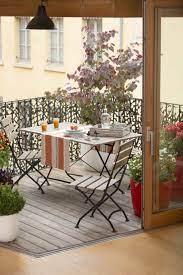 Ringhiere In Ferro Battuto Balcone Arredato Mobili Legno Ferro Balconi Idea Di Decorazione Decorazioni Esterne