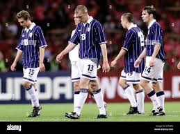 Scotland players (from left) Gareth Williams, Kevin Kyle, Scott Severn and  Robbie Stockdale leave the pitch after South Korea beat them 4-1 in a  friendly match at The Busan World Cup stadium,