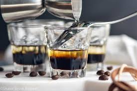 Combining vodka, coffee liqueur and sparkling water. Mind Eraser Shot Shake Drink Repeat