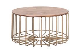 Elegant porcelain blue and pink cups turned upside down on abstract background. Troy Round Coffee Table Michael Murphy Home Furnishing