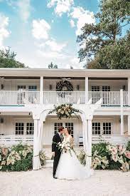 Little Point Clear Fairhope Al Sacred Heart Catholic Chapel Eastern Shore Art Center Fairhope Al Katie Max Farlow Photography Wedding Ceremony Traditions Wedding Suits Groom White Wedding