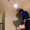 Luke was going to paint the ceiling with conor's help, but first they needed to scrape the loose bits 1