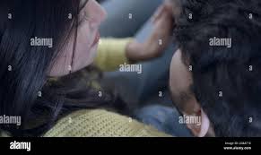 Closeup Shot Of An Indian Couple Holding A Purple Heart Stock Photo Alamy