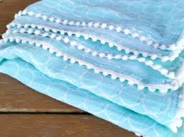 Double Gauze Baby Blanket Tutorial With Pom Poms