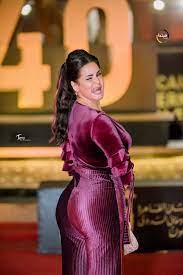 صور سما المصري تستعرض مؤخرتها الضخمة بفستان ارجواني يفصل جسمها high neck dress dresses egyptian actress