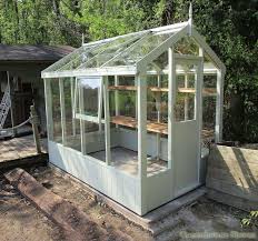 The shatterproof styrene glazing has been uv treated to protect plants from sun scorch and there's a roof. Swallow Kingfisher 6x8 Wooden Greenhouse In 2020 Wooden Greenhouses Timber Greenhouse Greenhouse