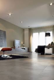 woonkamer met grote grijze keramische tegels in een beton look interieur woonkamer woonkamervloer woonkamer