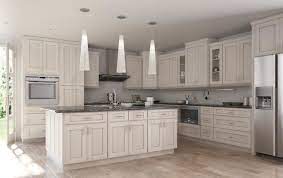 The meaning of chocolate glazing here is, as a matter of fact, an addition of chocolate brown color to the grooves of antique white cabinets. Society Shaker White With Brushed Chocolate Glaze The Society Series Shop Kitchen Cabinets Kitchen Cabinets Shop Kitchen Cabinets Glazed Kitchen Cabinets