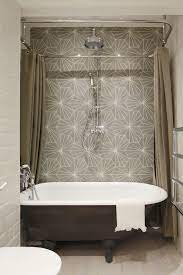 The installation instructions help clarify how to cut and shorten an oval shower curtain rod and how to adjust it to fit your space limitations. Black Claw Foot Tub Transitional Bathroom Oliver Burns