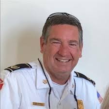 Twenty Six years ago the young man in the middle was a member of my Fire  Explorers Group.