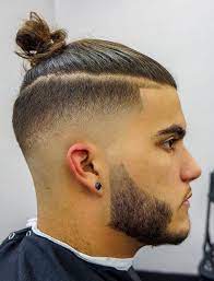 7 haircuts for the stage: The Top Knot Hairstyle Visual Guide For Men 7 Different Styles In 2021 Mohawk Hairstyles Men Man Ponytail Long Hair Styles Men