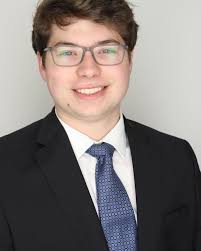 Hi, my name is Daniel Marquez. I'm a 3rd year Aerospace Engineering major  from The Woodlands, Texas. I enjoy racquetball, riding my motorcycle, and  rock climbing. This year I will be serving