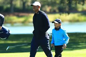 Tiger woods carried the bag for his son charlie who shows off his impressive golf swing. Tiger Woods Son Charlie Stealing Show At Pnc Championship