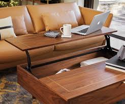 This coffee table has got a mango wood top that stands on legs made of blackened steel. Kallan Lift Top Storage Coffee Table Scandinavian Designs