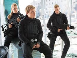 Misty Ormiston Josh Hutcherson And Kim Ormiston Hunger Games Hunger Games Costume Hunger Games Mockingjay