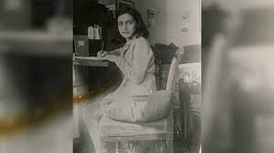 She is leaning out of the window to get a good look of the young couple next door, who are. Anne Frank Diary Biography Facts History