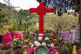 Fiesta is a family business with over 25 years experience. Cross In The Street Of Red And White Flowers On The Occasion Of The Fiestas De