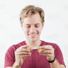 Man holding fortune cookie