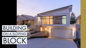 Amazingplans.com offers house plan designs for narrow lots from designers in the united states and canada. Building A House On A Slope Novus Homes