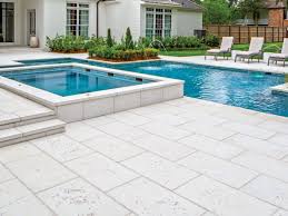 Square patio stone is an easy addition to a patio or pathway. Concrete Pavers For Pools Poolside Concrete Paving