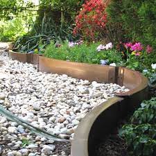 Find 37 practical, affordable and good looking landscape garden edging ideas to compliment your lawn and landscaping to give your flower bed borders mo. 68 Creative Cheap Garden Edging Ideas That Will Transform Your Yard Garden Edging Landscaping Inspiration Landscape Edging